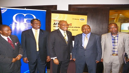 L-R: Adedeji Adesemoye, CBN Representative;  Austin Okere, Founder & Group CEO, Computer Warehouse Group Plc; Babatunde Osho, Chief Enterprise Solutions Officer, MTN; Honourable Jethro Akun, National Chairman (NAMB); Valentine Whensu, Chairman (NAMB), Lagos State  at the launch of Microfinance Banking Software as a Service dubbed MTN Xaas in Lagos in 2012.